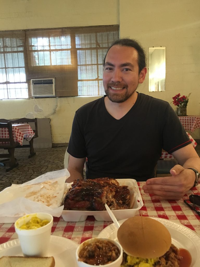 I am trying to show you how tall this pile of ribs is.