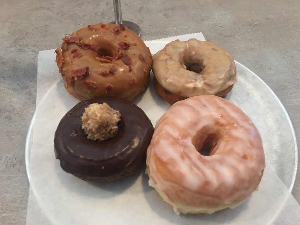 CW from top left: Maple Bacon Bourbon, Blueberry Pancake, Glazed ring, German chocolate cake.
